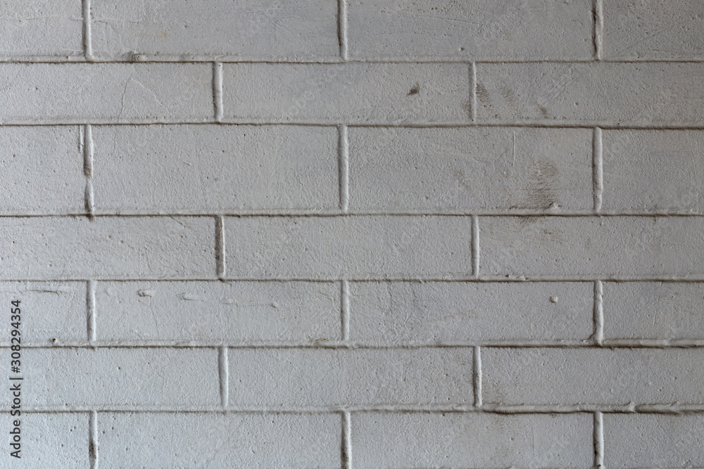 Fototapeta premium Old white brick wall.