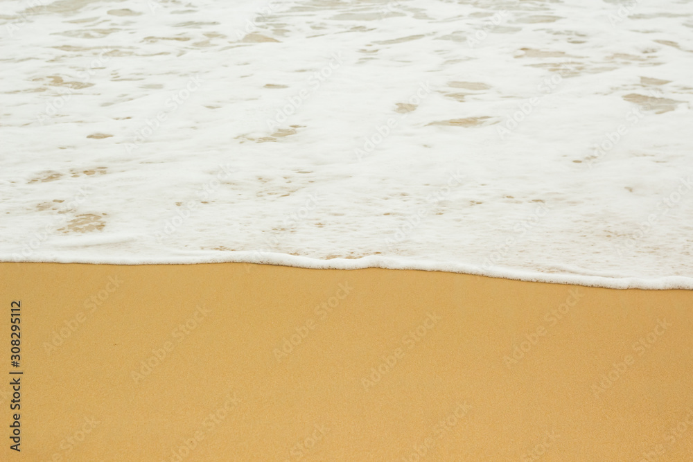 white sea foam on yellow sand, sea background, sandy beach white sea foam on yellow sand, sea background, sandy beach