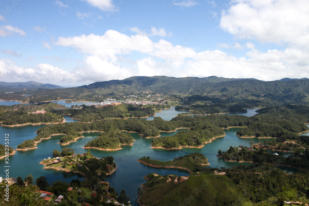 View from the heights of the Peñol-Guatapé Reservoir on a cloudy summer day