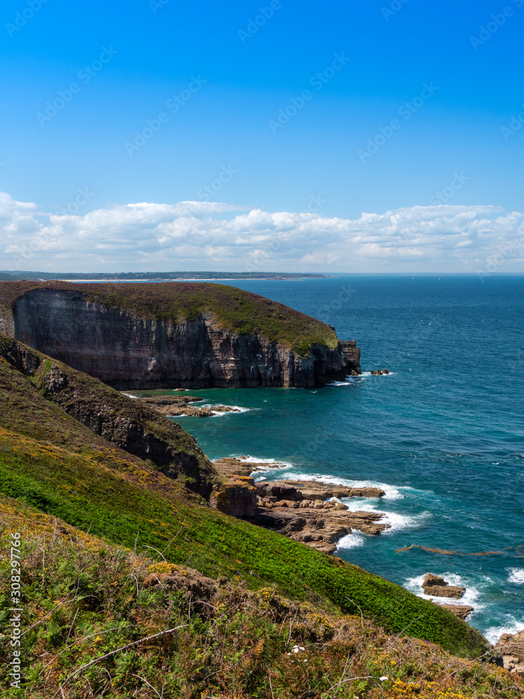 A scenic view of the cliffs on a coast of the Atlantic ocean.