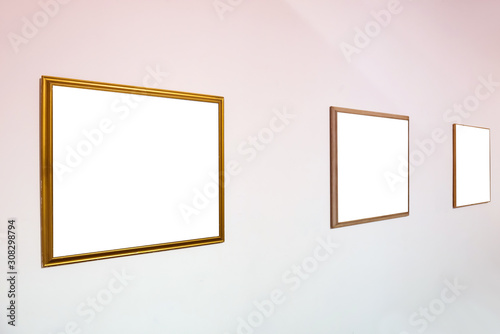 Empty blank picture wooden white isolated frame in interior on wall