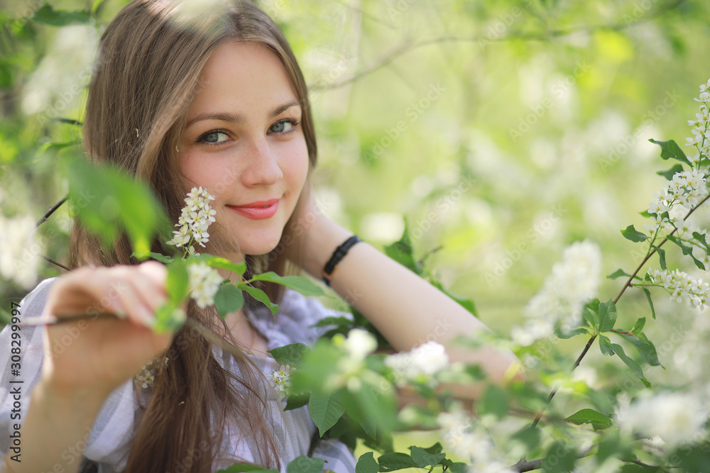 A girl in a spring green park A girl in a spring green park