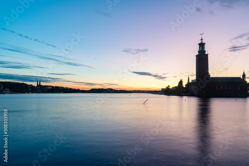 Panoramic view of Riddarfjarden Stockholm City Hall at sunset time.