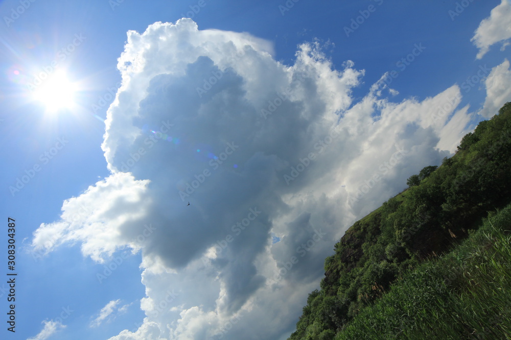 Obraz premium White clouds on a blue sky.