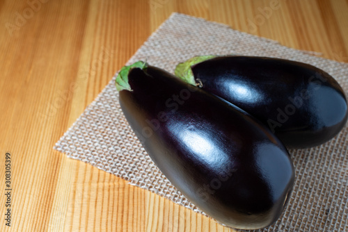 eggplants on a wooden kitchen table