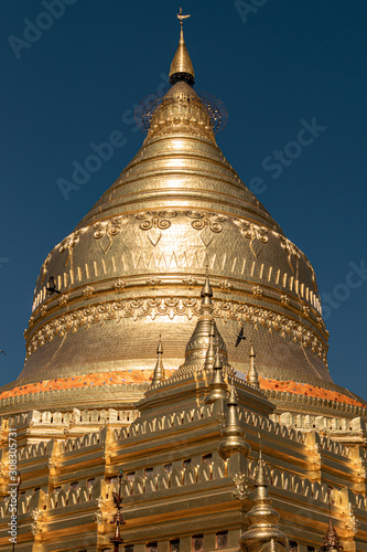 Gilded stupa of Shwezigon Pagoda, Mandalay Division, a Buddhist temple located in Nyaung-U, a town near Bagan, in Myanmar.