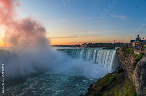 Niagara Falls is a group of three waterfalls at the southern end of Niagara Gorge  between the Canadian province of Ontario and the US state of New York