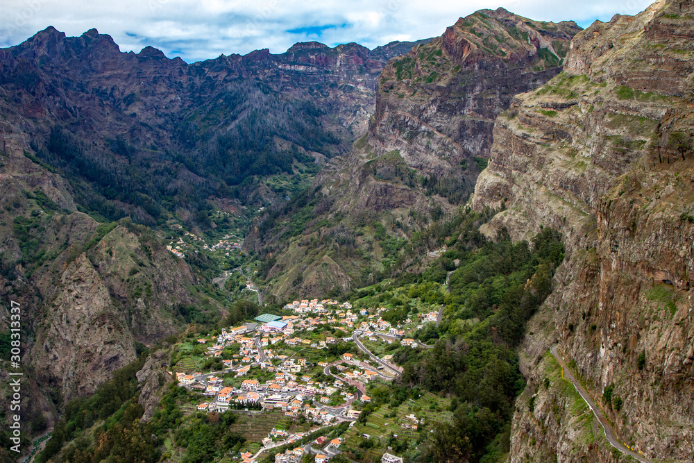 Curral das Freiras - Beautiful view of mountain range in Madeira Island, Portugal Curral das Freiras - Beautiful view of mountain range in Madeira Island, Portugal