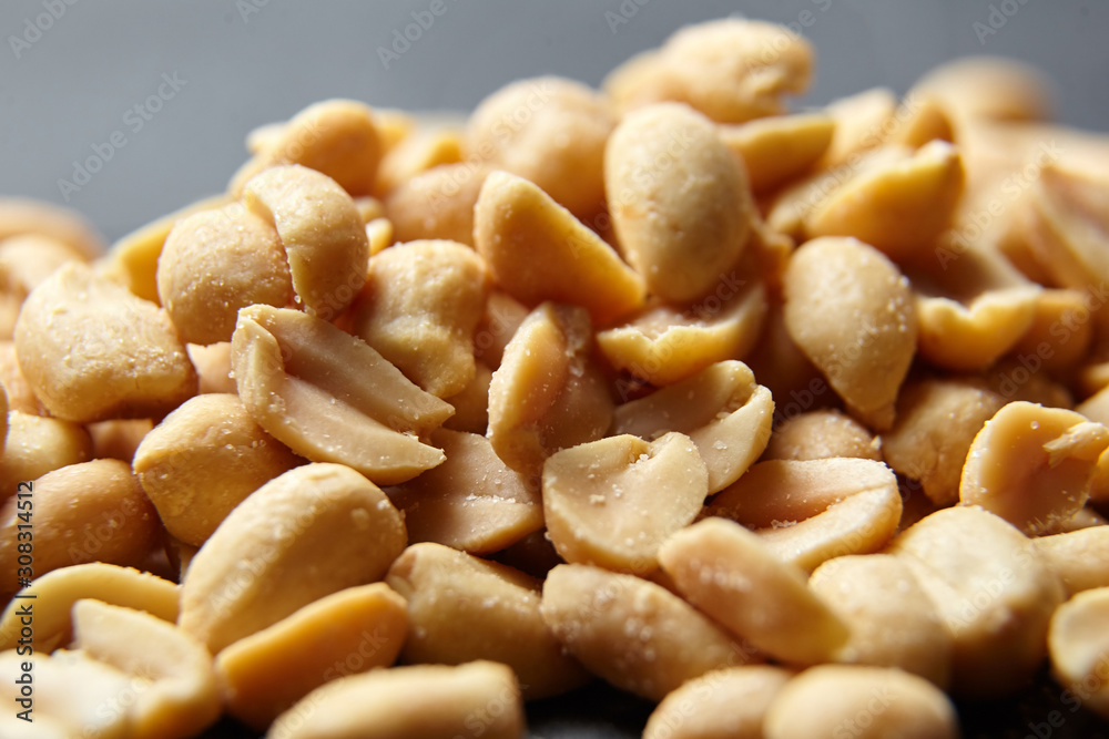 Beer snack. Salty roasted peeled peanuts closeup Beer snack. Salty roasted peeled peanuts closeup