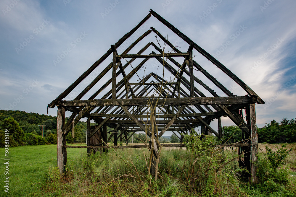 old burnt barn in the meadow