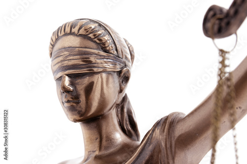 Lady Justice statue - Greek ancient goddess Themis a symbol of justice isolated on white
