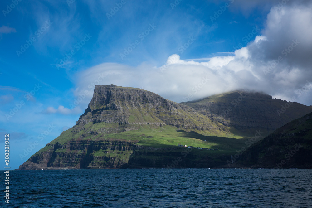 Green cliffs and hills in Faroe Islands