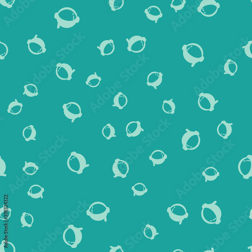 Green Astronaut helmet icon isolated seamless pattern on green background. Vector Illustration
