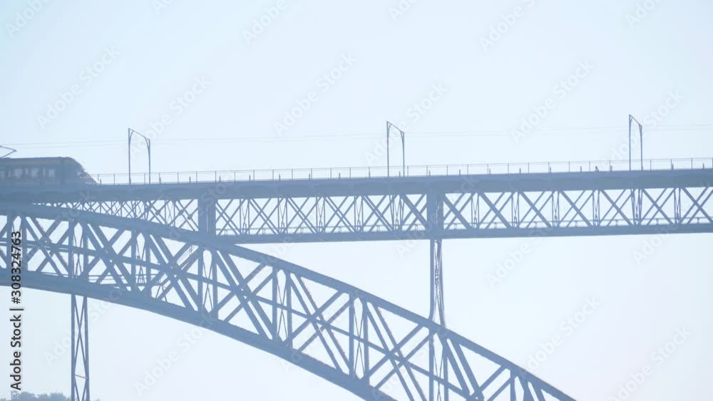 Metro train crossig metal bridge Dom Luis in porto portugal 4k Metro train crossig metal bridge Dom Luis in porto portugal 4k