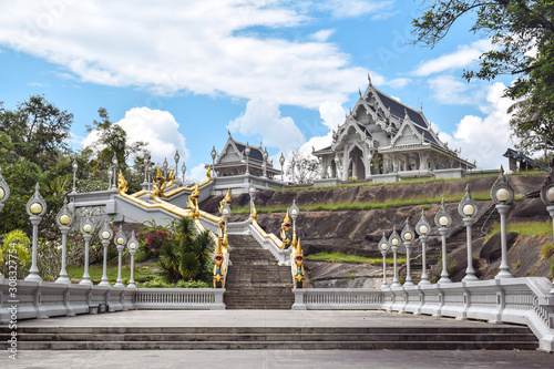 Staircase leading to beautiful white temple Wat Kaew Korawaram in Krabi Town Thailand