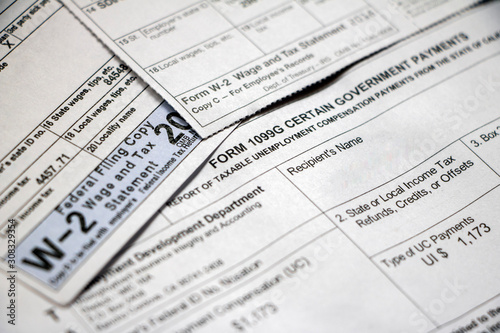 Closeup of 1099G and W-2 tax forms
