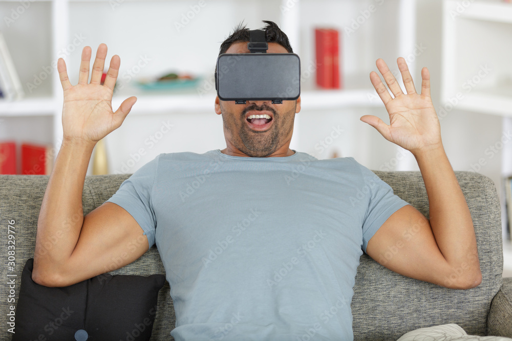 man surprised by virtual reality man surprised by virtual reality