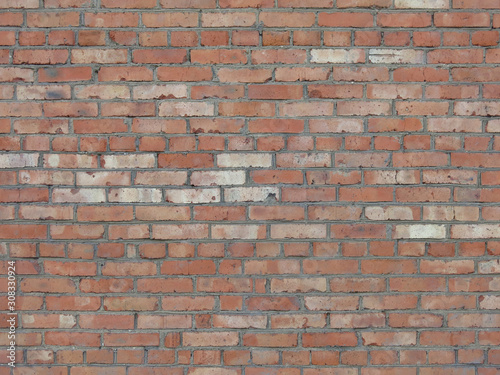 wall texture with lots of brown and red bricks