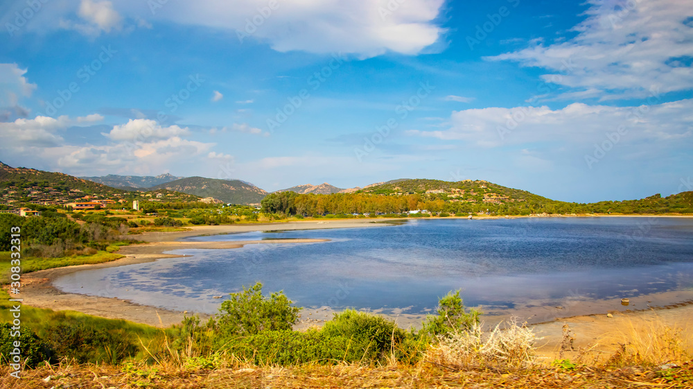 Bay near Chia beach in southern Sardinia, Italy. It's the Mediterranean Sea. This is where flamingos live.