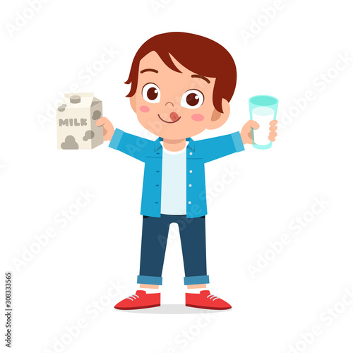 happy cute kid boy drink fresh milk