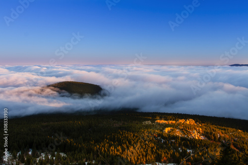 Sunrise and Inversion at Jested mountain close town Liberec, Czech republic, snow and winter and view of funicular. © Jiří Fejkl