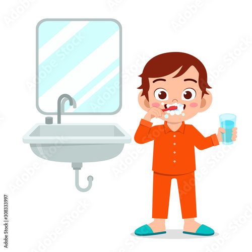 happy cute kid boy brush clean teeth