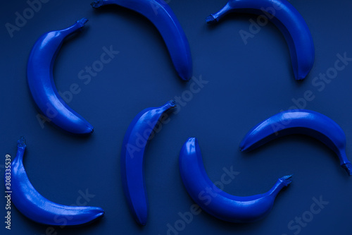 Pantone classic blue bananas on the blue background photo