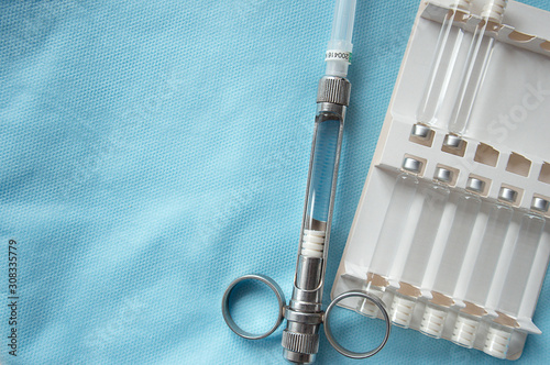dental syringe and carpules with dental anesthesia, lidocaine articaine mepivacaine novocaine photo