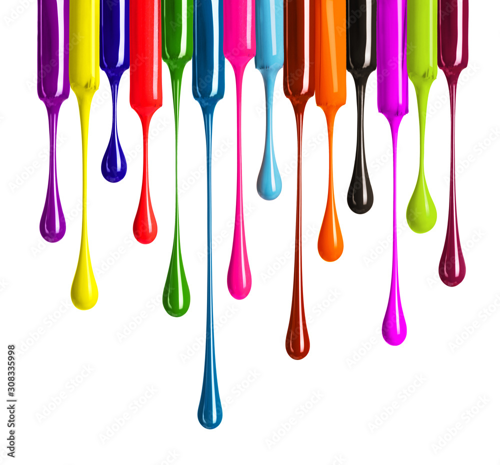 Colorful drops of nail polish drip from brushes close-up on white background