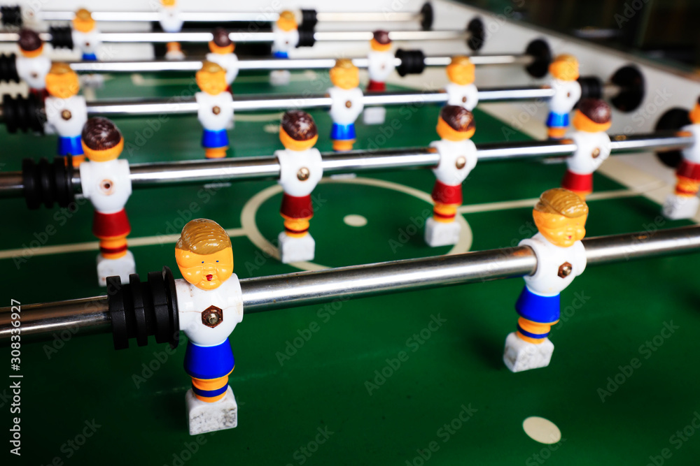 dolls of a retro foosball table to play table football dolls of a retro foosball table to play table football