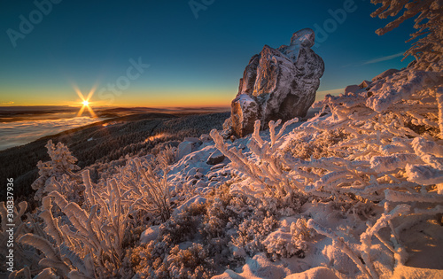 Sunrise and Inversion at Jested mountain close town Liberec  Czech republic  snow and winter and view of funicular  snow corals.