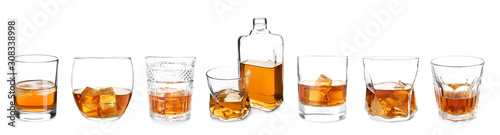 Photo Bottle and glasses of whiskey on white background