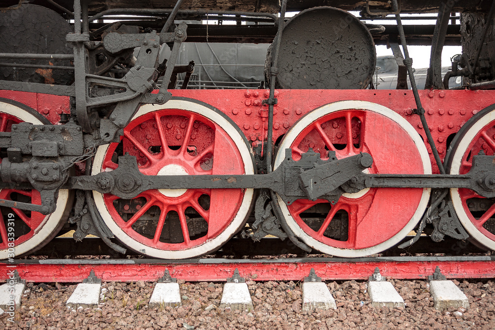 wheels of an ancient locomotive close-up, retro vehicle