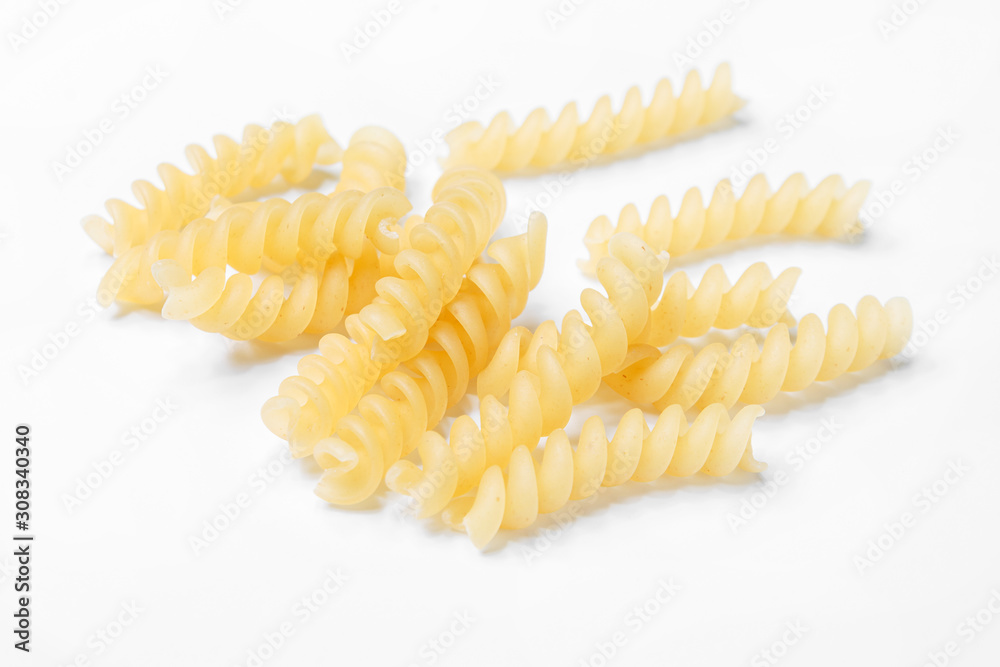 pasta from durum wheat curls fusilli, cavatappi, unprepared, raw pasta cellentani handmade isolated on white background close up macro pasta from durum wheat curls fusilli, cavatappi, unprepared, raw pasta cellentani handmade isolated on white background close up macro