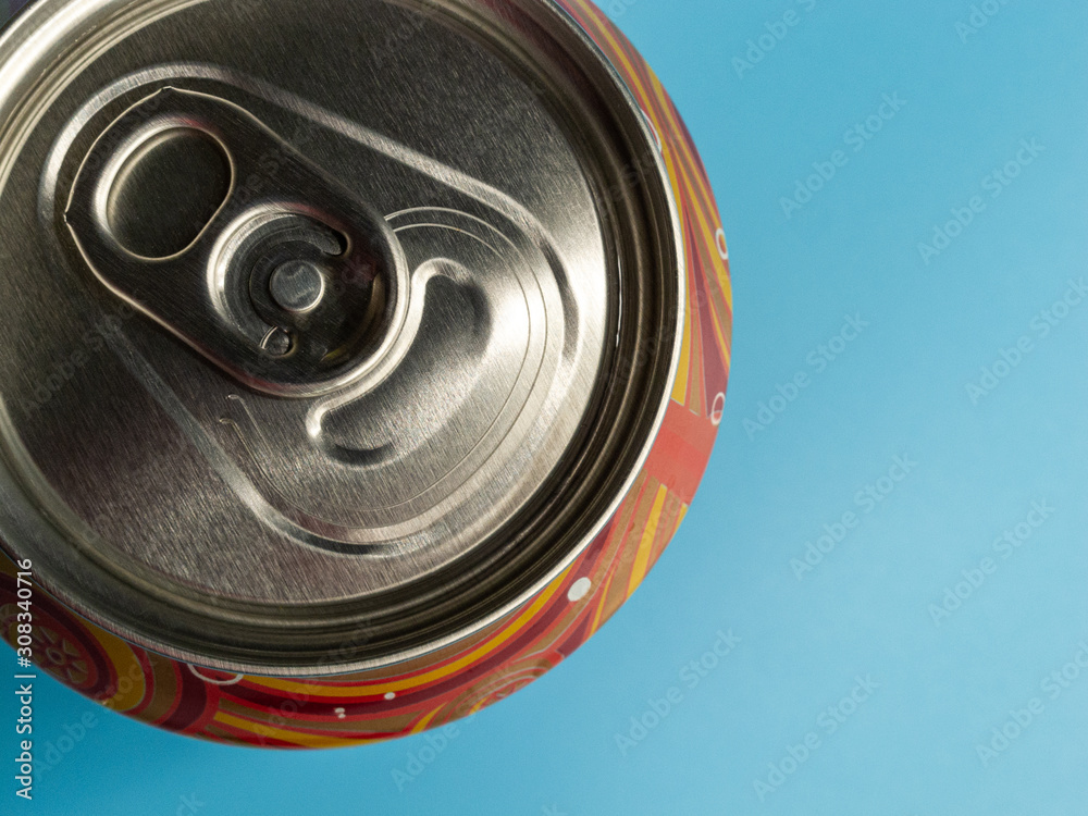 aluminum soda and beer beverage can with water droplets isolated on blue background, metal can, recyclable product aluminum soda and beer beverage can with water droplets isolated on blue background, metal can, recyclable product