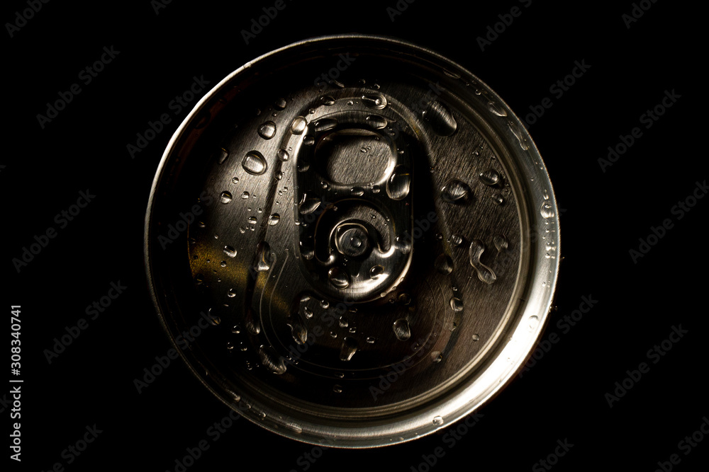 aluminum soda and beer beverage can with water droplets isolated on dark background, metal can, recyclable product aluminum soda and beer beverage can with water droplets isolated on dark background, metal can, recyclable product