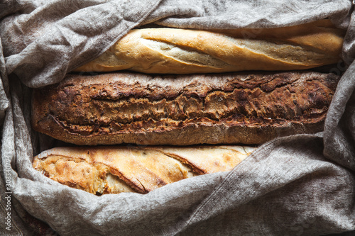 Baguette mix on a black background. French pastries, homemade.