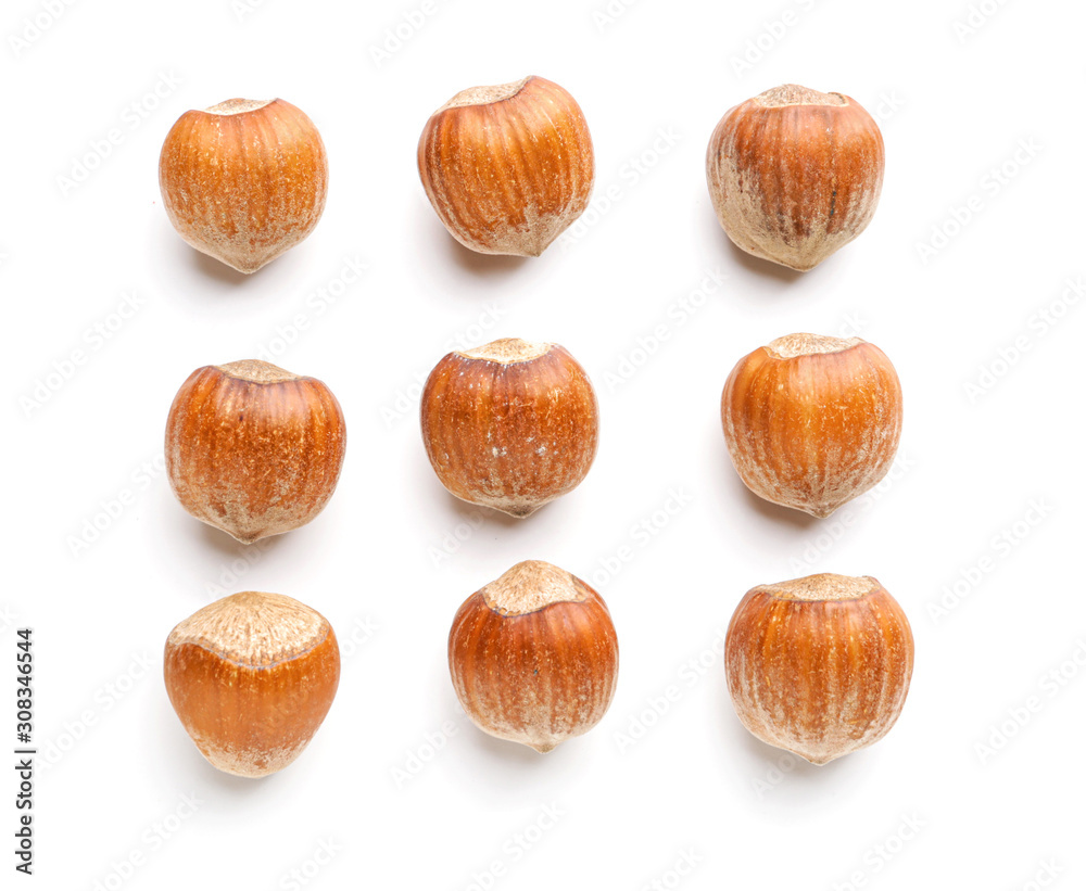 Tasty hazelnuts on white background Tasty hazelnuts on white background