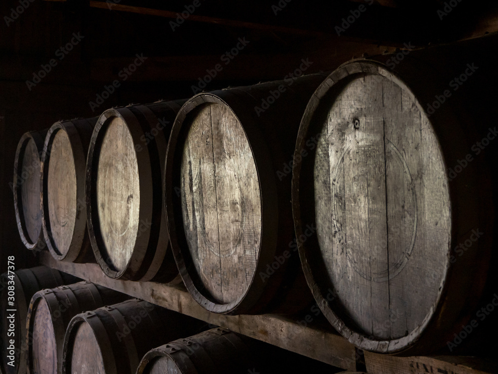 Wooden barrels in a warehouse of a whiskey distillery in Hokkaido, Japan