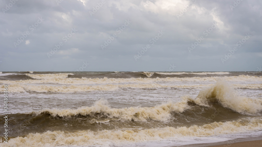 Large waves hit Batu Buruk Beach in Kuala Terengganu during monsoon season.