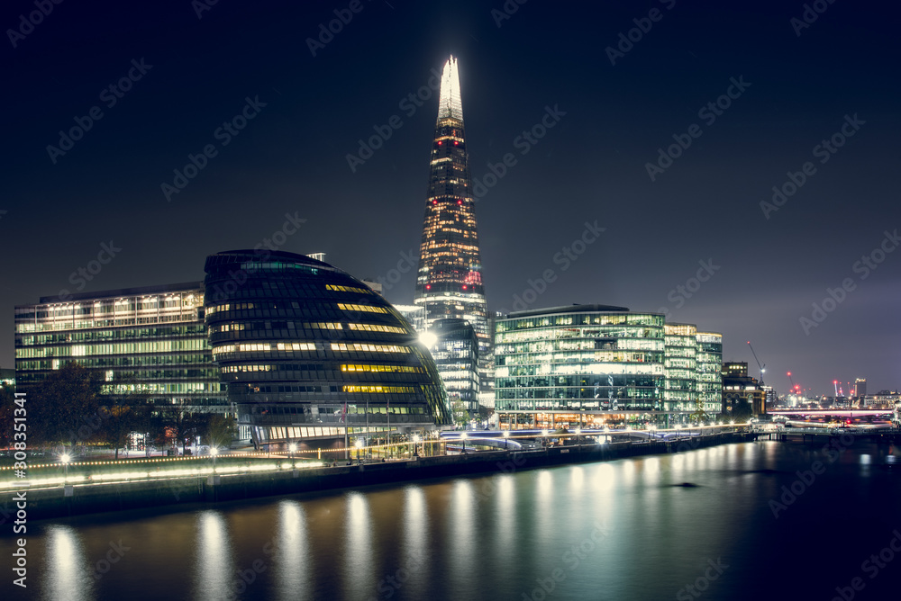 View of Illuminated Buildings at Night With the Shard in the Middle, in the City of London, UK View of Illuminated Buildings at Night With the Shard in the Middle, in the City of London, UK