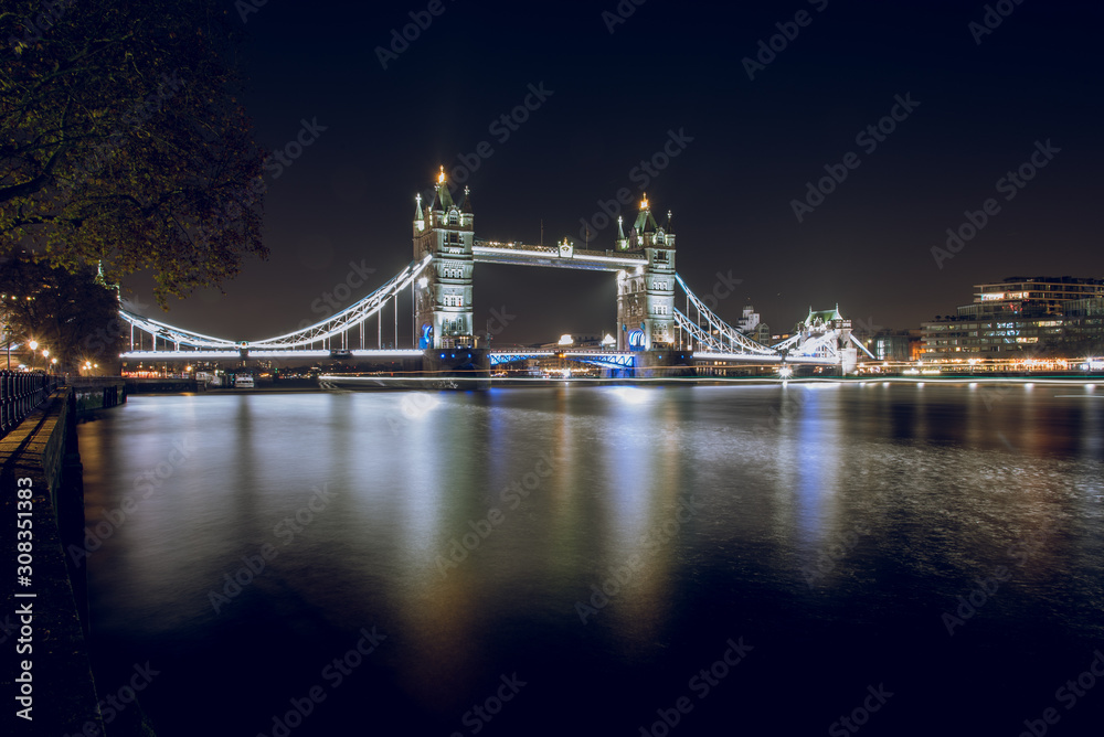 Tower Bridge Illuminated at Night in London, UK