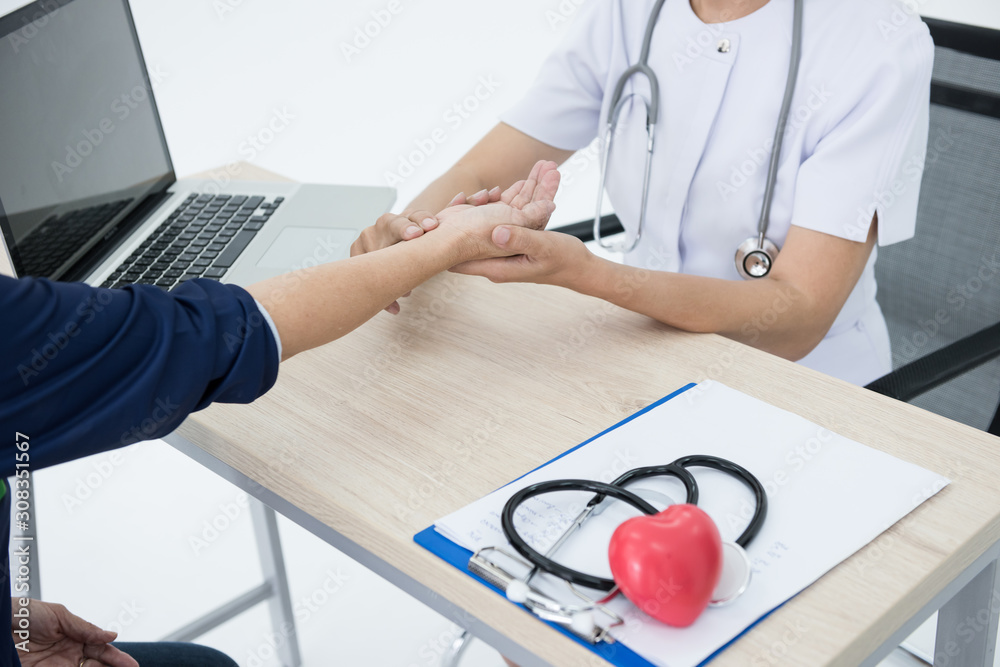 doctor with stethoscope head ready to examing patient, doctor with stethoscope and check body by catch the pulse doctor with stethoscope head ready to examing patient, doctor with stethoscope and check body by catch the pulse