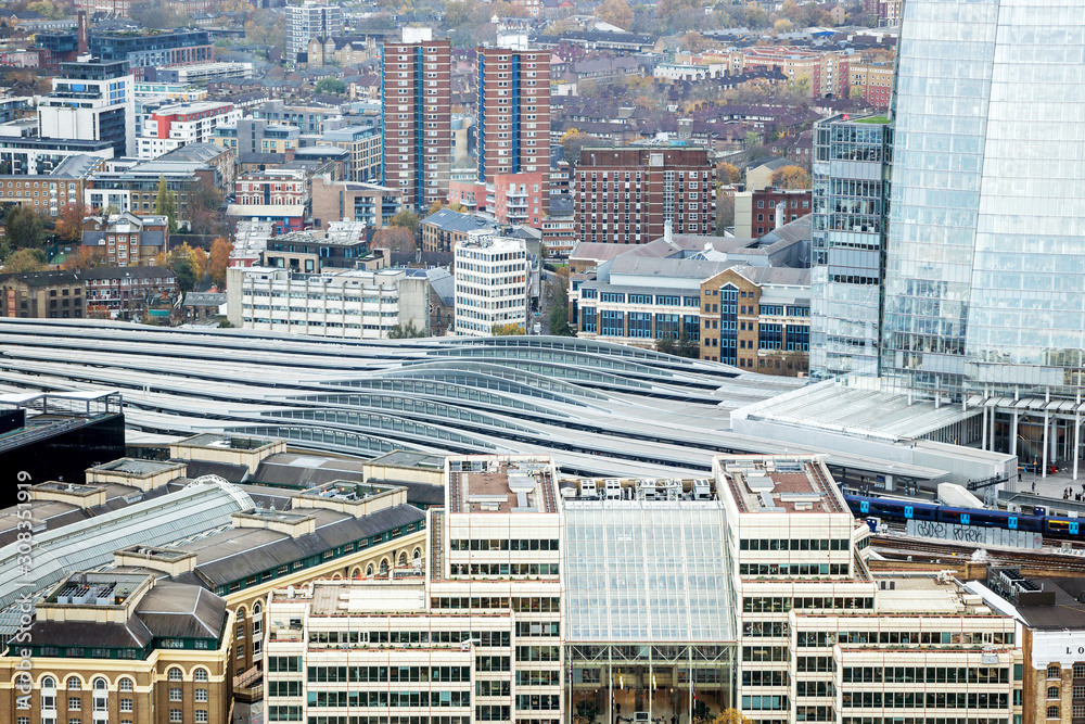 Aerial cityscape of modern London Bridge train station construction
