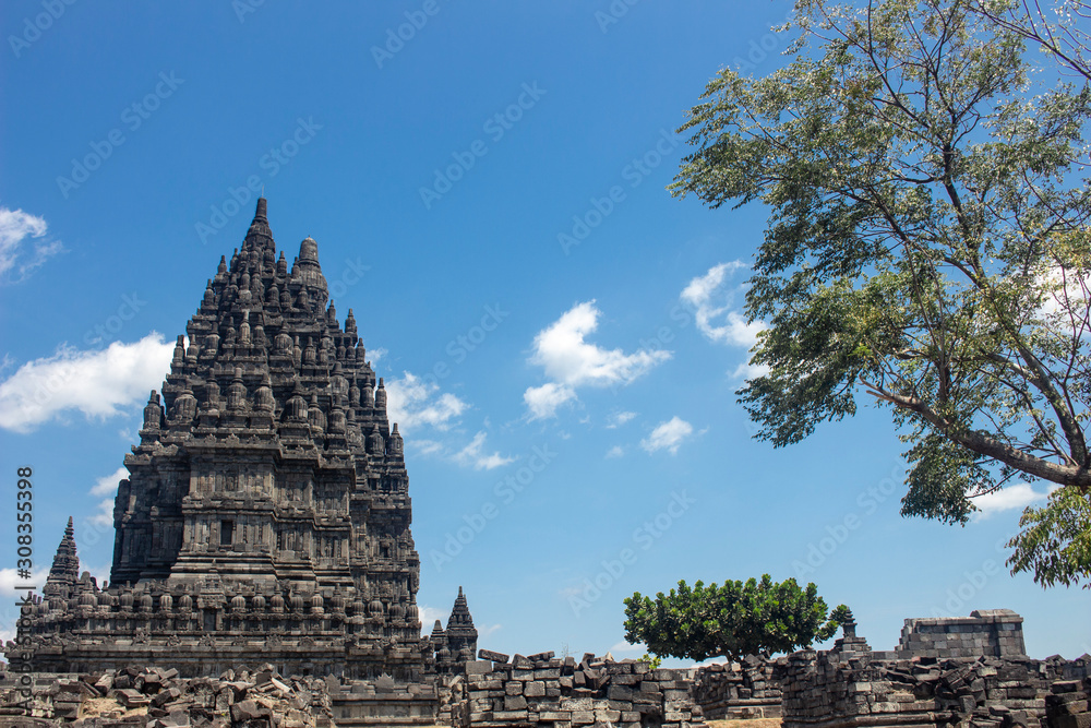 Candi Prambanan or Rara Jonggrang, Hindu temple compound on background. Impressive architectural site. Yogyakarta, Central Java, Indonesia Candi Prambanan or Rara Jonggrang, Hindu temple compound on background. Impressive architectural site. Yogyakarta, Central Java, Indonesia