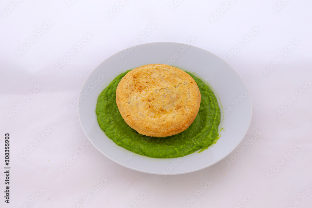 Beef pie with mushy peas