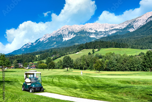 Golf course in Oberndorf near the Wilden Kaiser montains, Austria photo