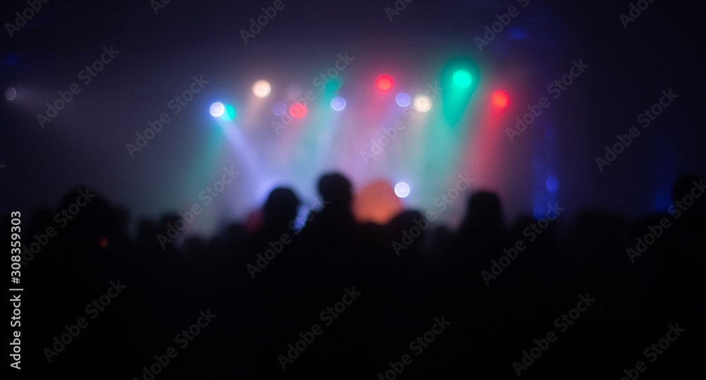 abstrac defocus  images people are at a party with colorful lights