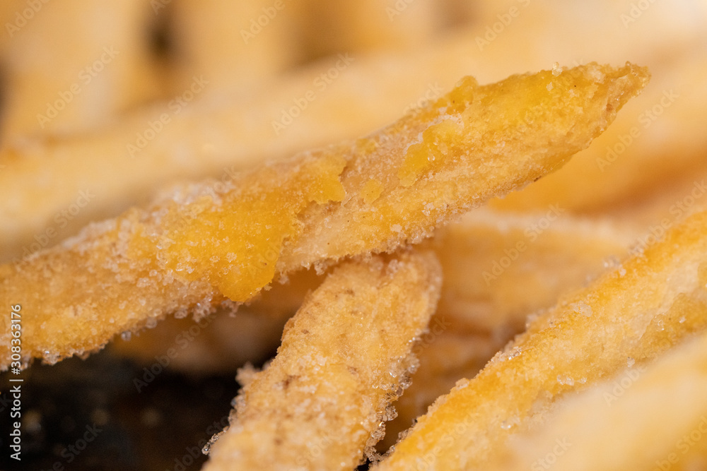Frozen frosted french fries close up macro . Frozen frosted french fries close up macro .