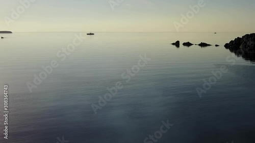 Coastline of Arctic Ocean in summer on desert Novaya Zemlya and lonely abandoned world of wildlife and nature of quiet north. photo